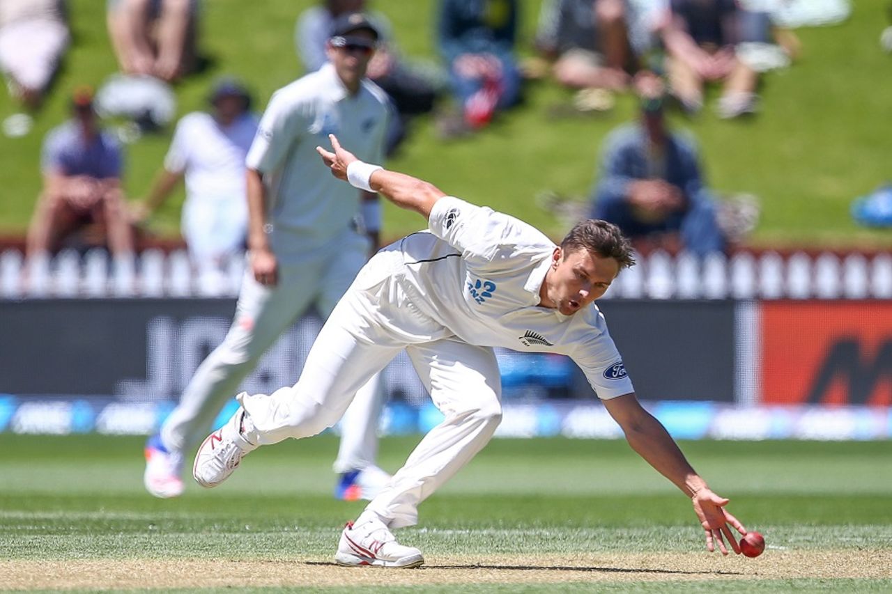 Trent Boult moves to his left to field off his own bowling, New Zealand v Bangladesh, 1st Test, Wellington, 2nd day, January 13, 2017