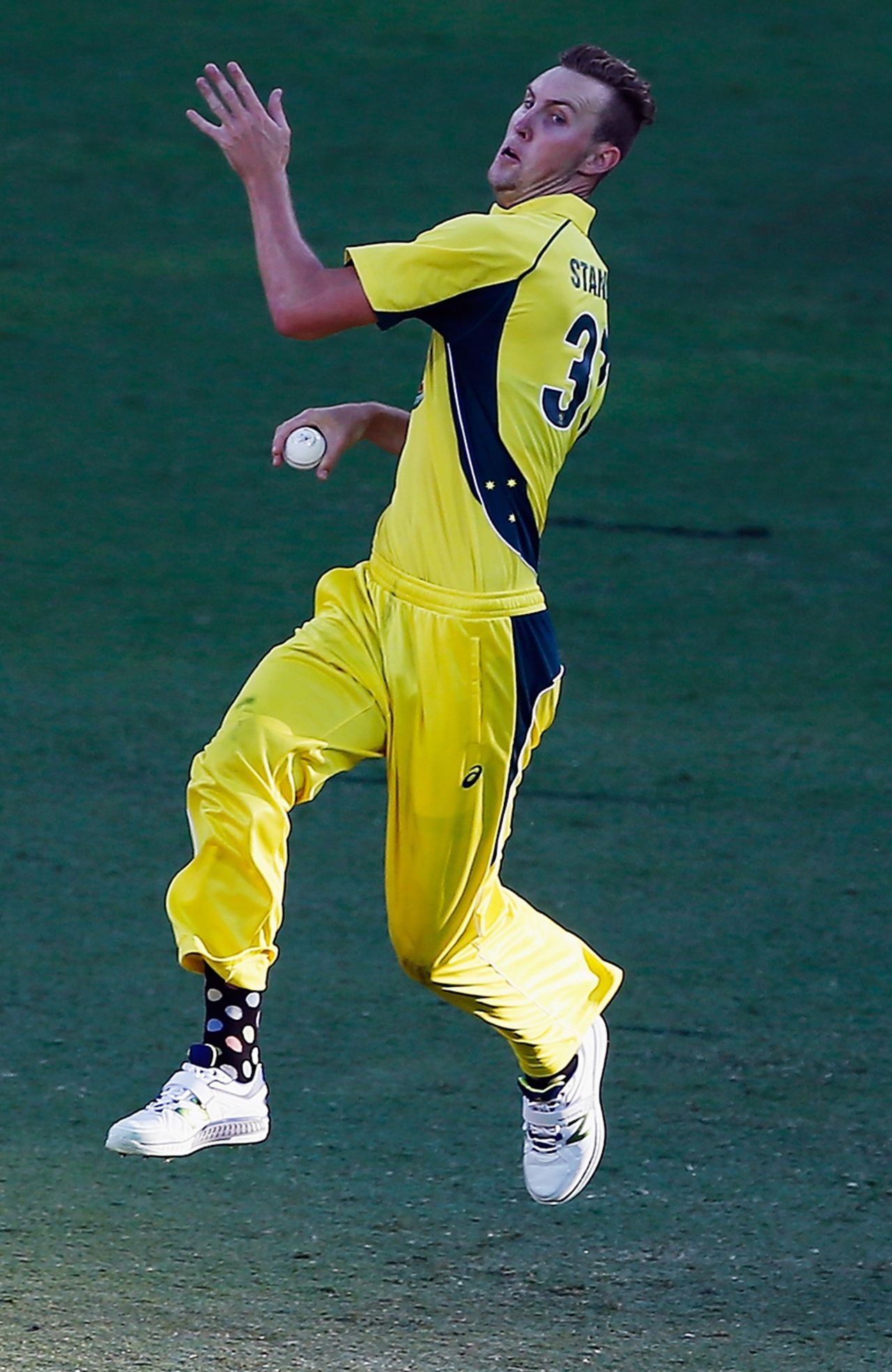 Billy Stanlake shows off his snazzy socks in his pre-delivery jump, Australia v Pakistan, 1st ODI, Brisbane, January 13, 2017