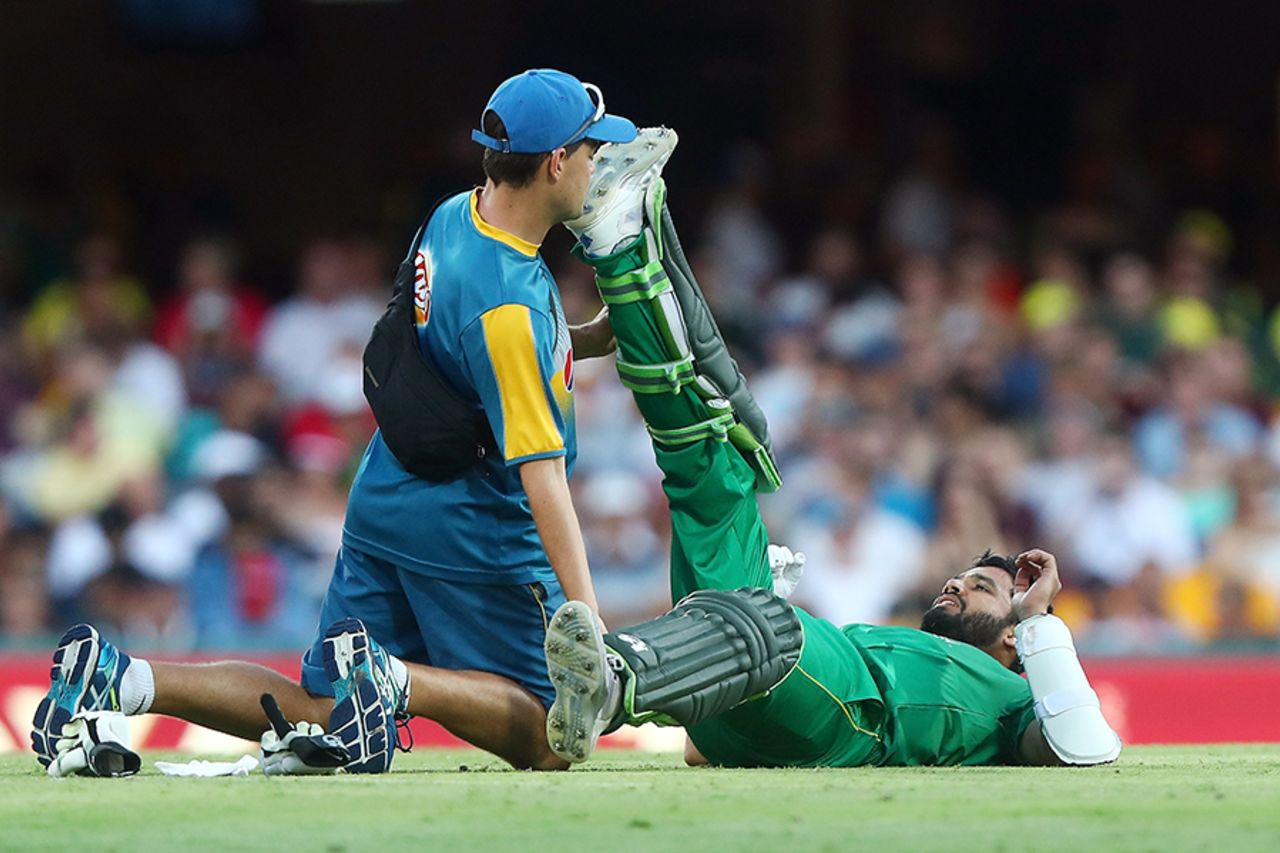 Azhar Ali gets some assistance after pulling up with a cramp, Australia v Pakistan, 1st ODI, Brisbane, January 13, 2017