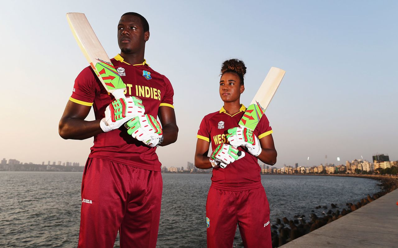 Carlos Brathwaite and Hayley Matthews pose for photographs by the sea in Mumbai, Australia v West Indies, March 30, 2016