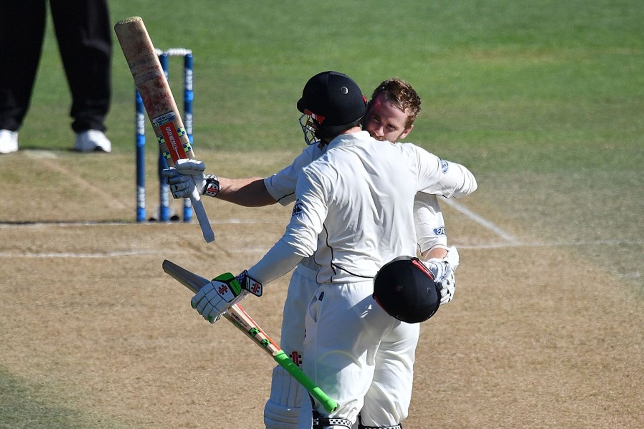 Kane Williamson is embraced by Henry Nicholls after he raised a century, New Zealand v Bangladesh, 1st Test, Wellington, 5th day, January 16, 2017