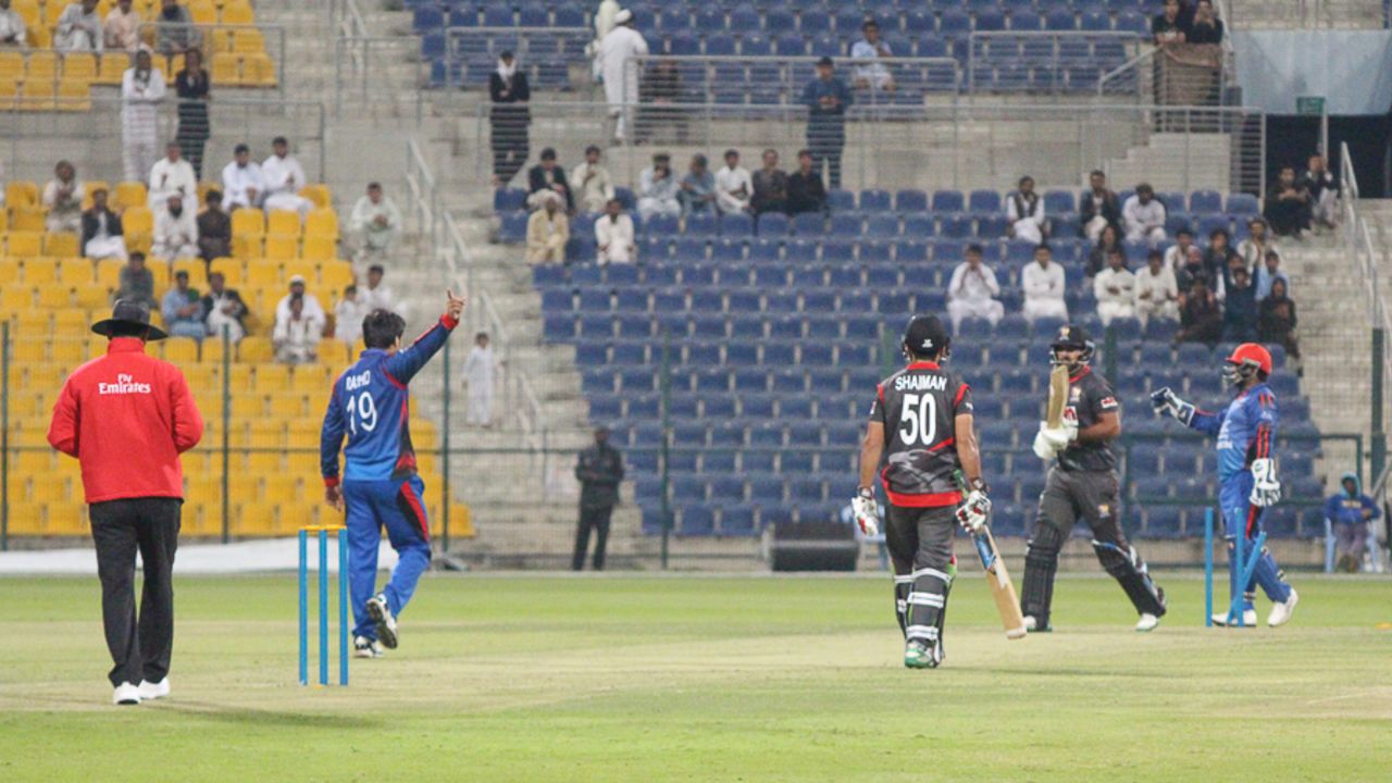 Rashid Khan points Muhammad Usman back to the pavilion after bowling him behind his legs, UAE v Afghanistan, Desert T20, Group A, Abu Dhabi, January 16, 2017