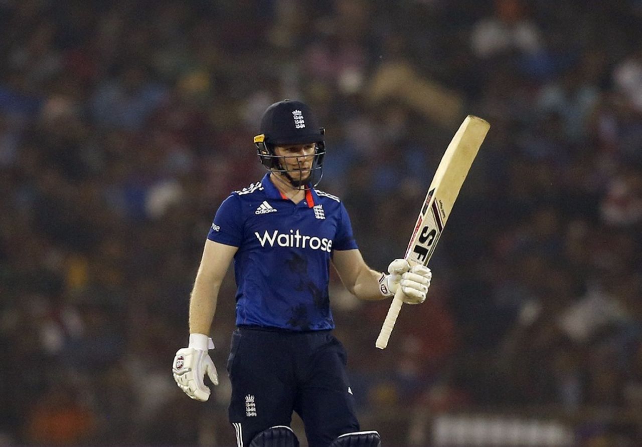 Eoin Morgan raises his bat after reaching fifty, India v England, 2nd ODI, Cuttack, January 19, 2017