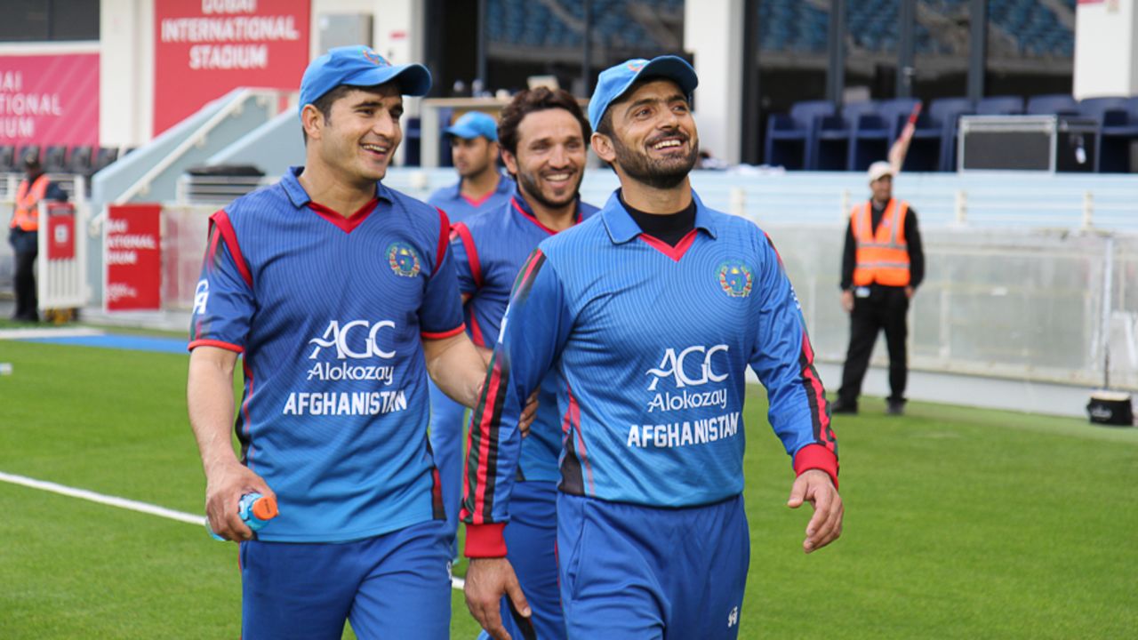 Nawroz Mangal leads the Afghanistan side to the crowd to wave back their appreciation, Afghanistan v Namibia, Desert T20, Group A, Dubai, January 19, 2017