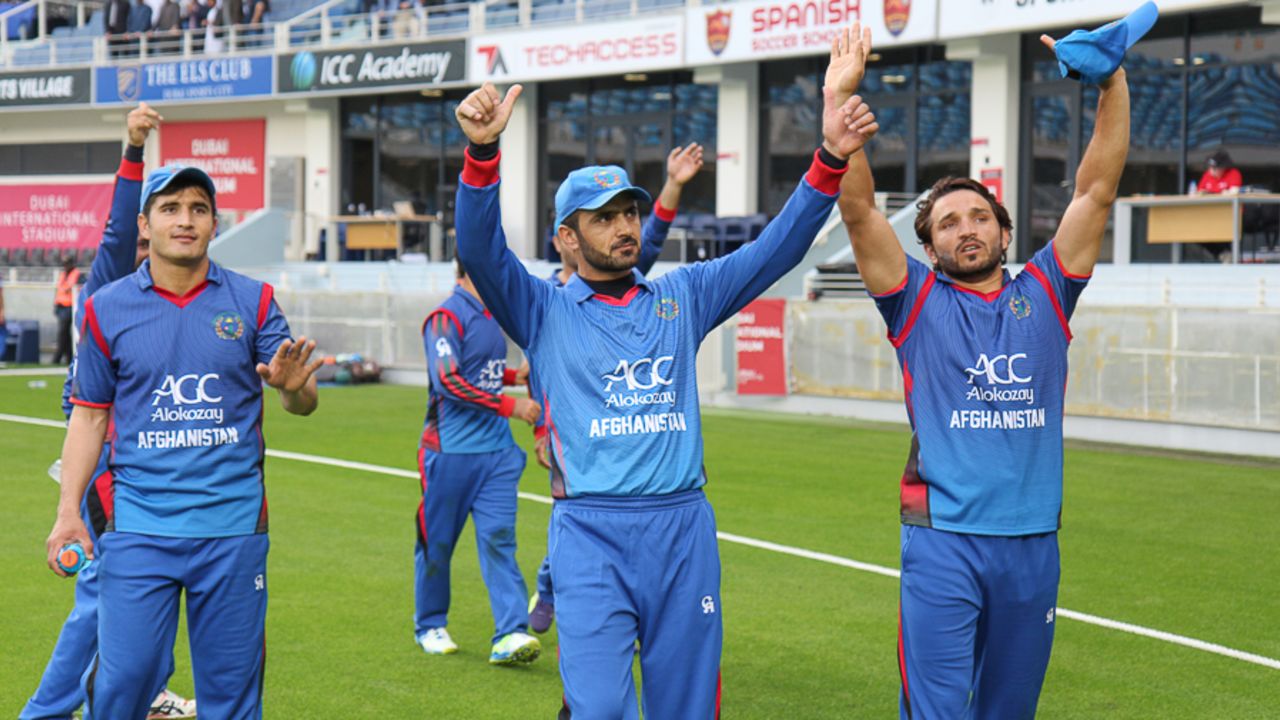 Nawroz Mangal gives a thumbs up to the 3000 fans who turned out to support his side, Afghanistan v Namibia, Desert T20, Group A, Dubai, January 19, 2017