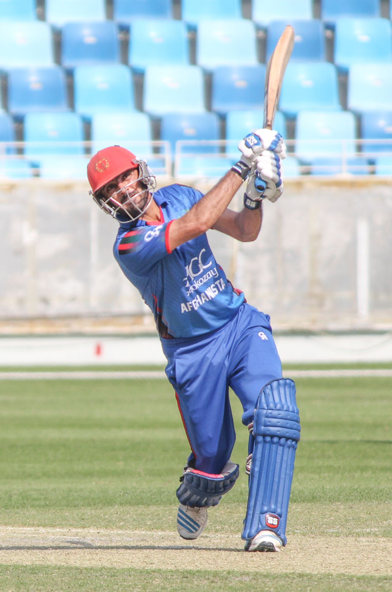 Nawroz Mangal drives wide of long -off for a boundary during his 34, Afghanistan v Oman, Desert T20, 1st semi-final, Dubai, January 20, 2017