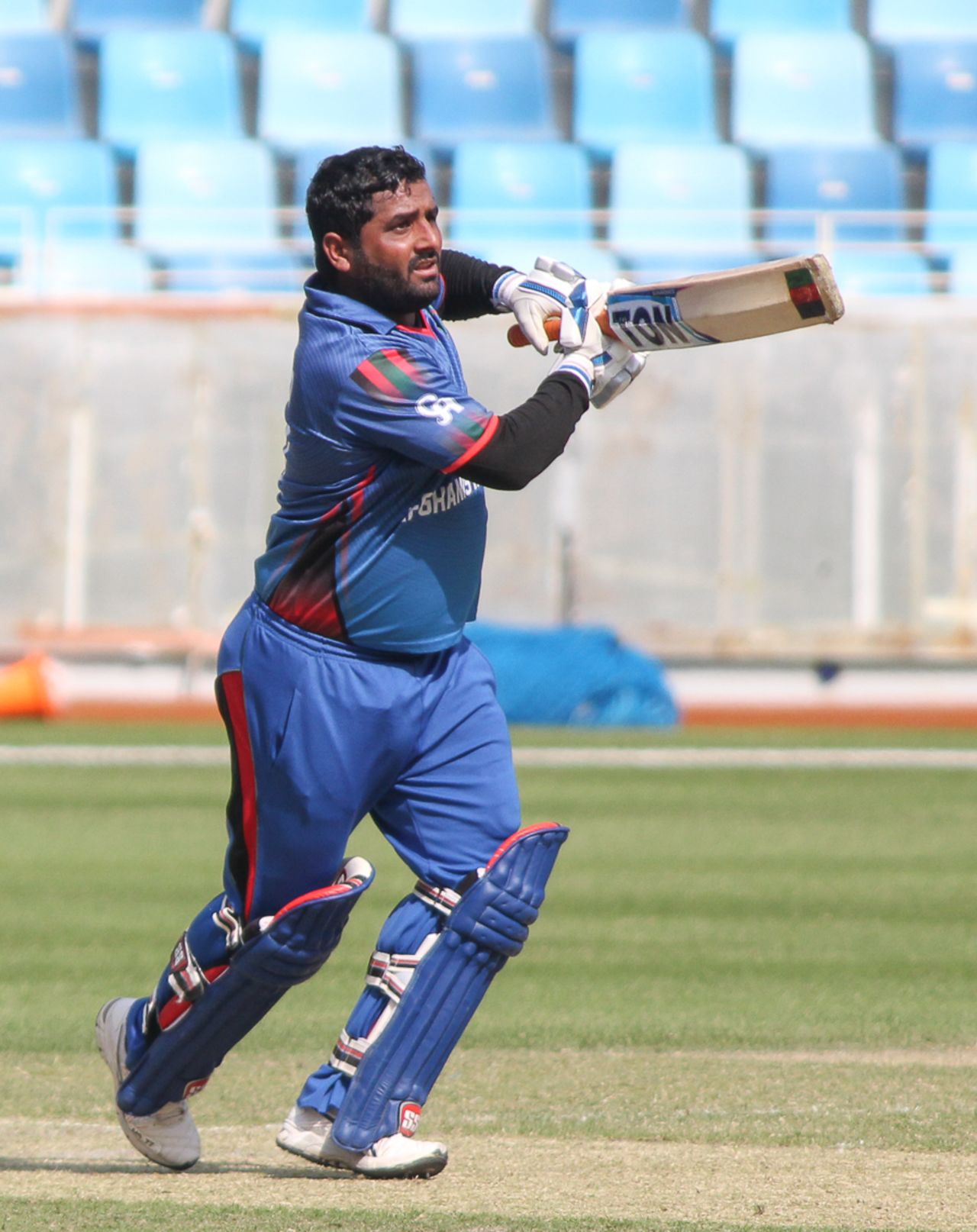 Mohammad Shahzad scoops a single down the ground during his 80, Afghanistan v Oman, Desert T20, 1st semi-final, Dubai, January 20, 2017