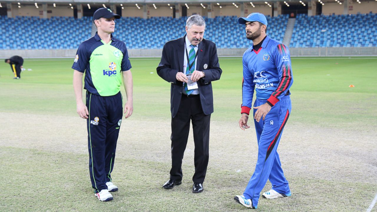 Nawroz Mangal spins the coin toss in his final match for Afghanistan, Afghanistan v Ireland, Desert T20, Final, Dubai, January 20, 2017