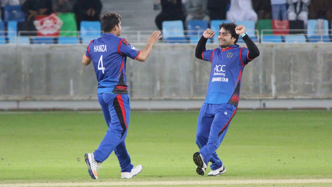 Rashid Khan rushes in to celebrate a wicket with Amir Hamza, Afghanistan v Ireland, Desert T20, Final, Dubai, January 20, 2017