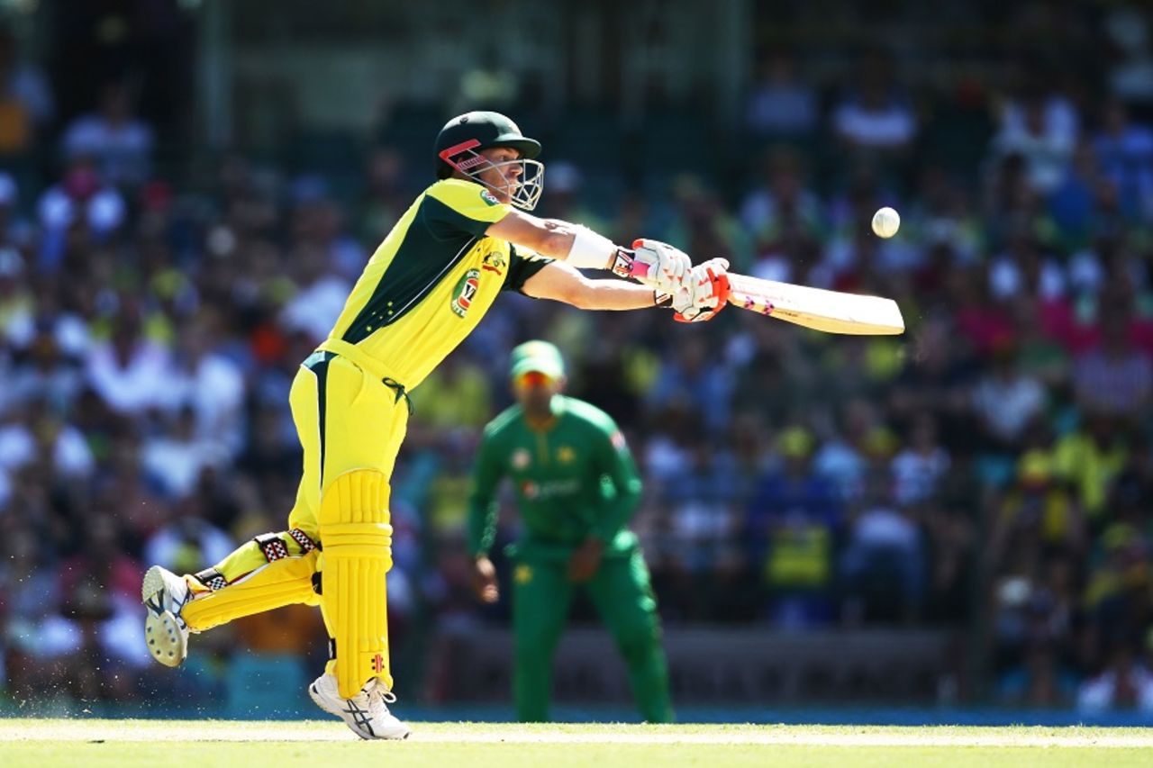 David Warner reaches out to scythe the ball away, Australia v Pakistan, 4th ODI, Sydney, January 22, 2017