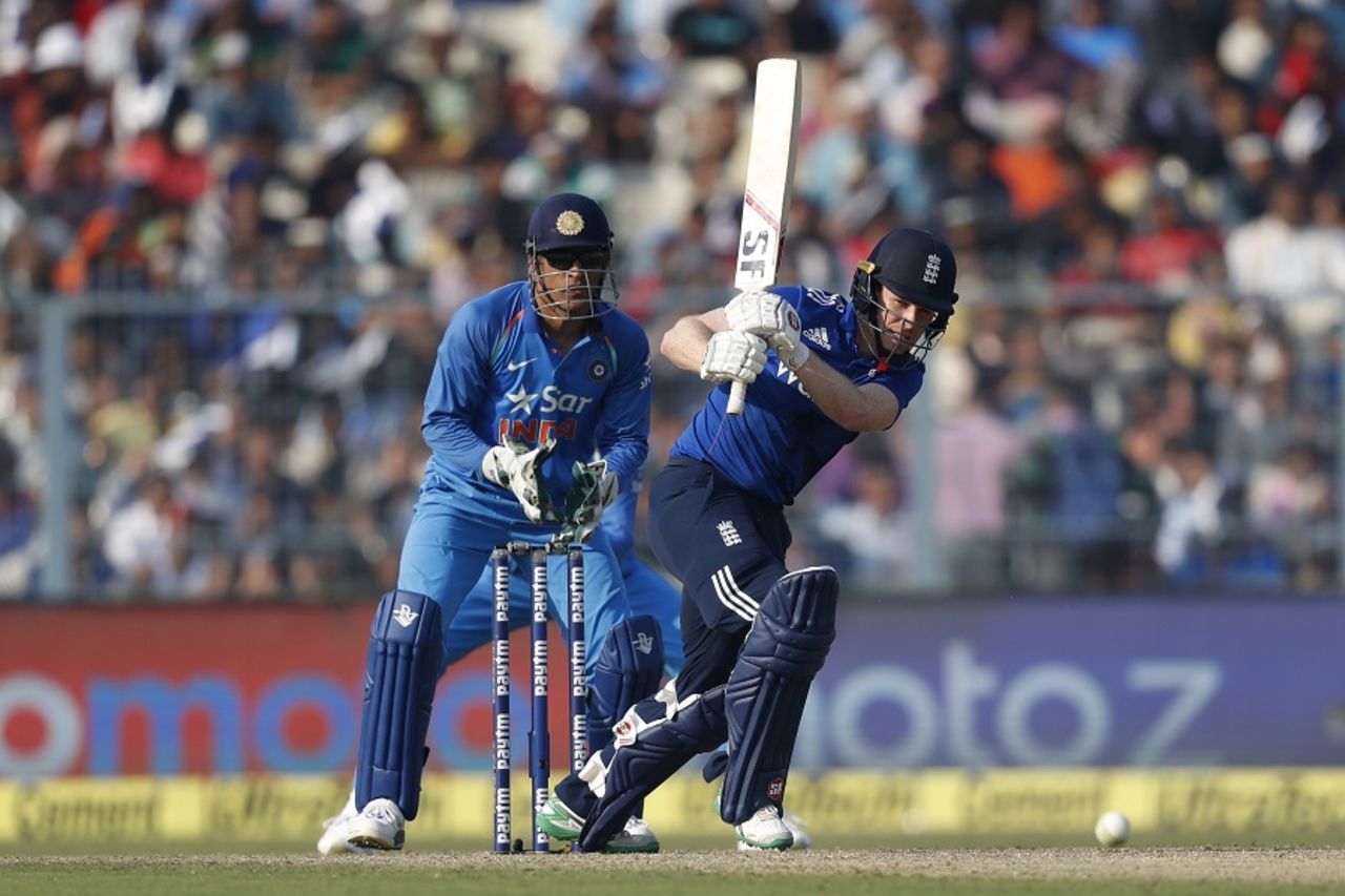 Eoin Morgan muscles the ball away, India v England, 3rd ODI, Kolkata, January 22, 2017