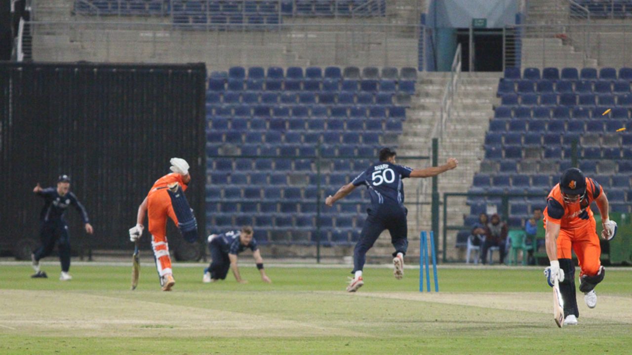 Safyaan Sharif completes the runout of Paul van Meekeren to end the match, Netherlands v Scotland, Desert T20, Group B, Abu Dhabi, January 17, 2017