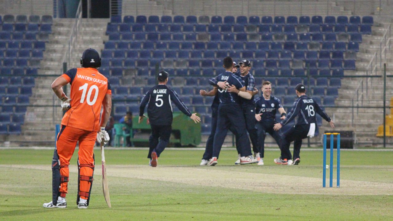 Scotland celebrates after Paul van Meekeren is run out to end the match, Netherlands v Scotland, Desert T20, Group B, Abu Dhabi, January 17, 2017