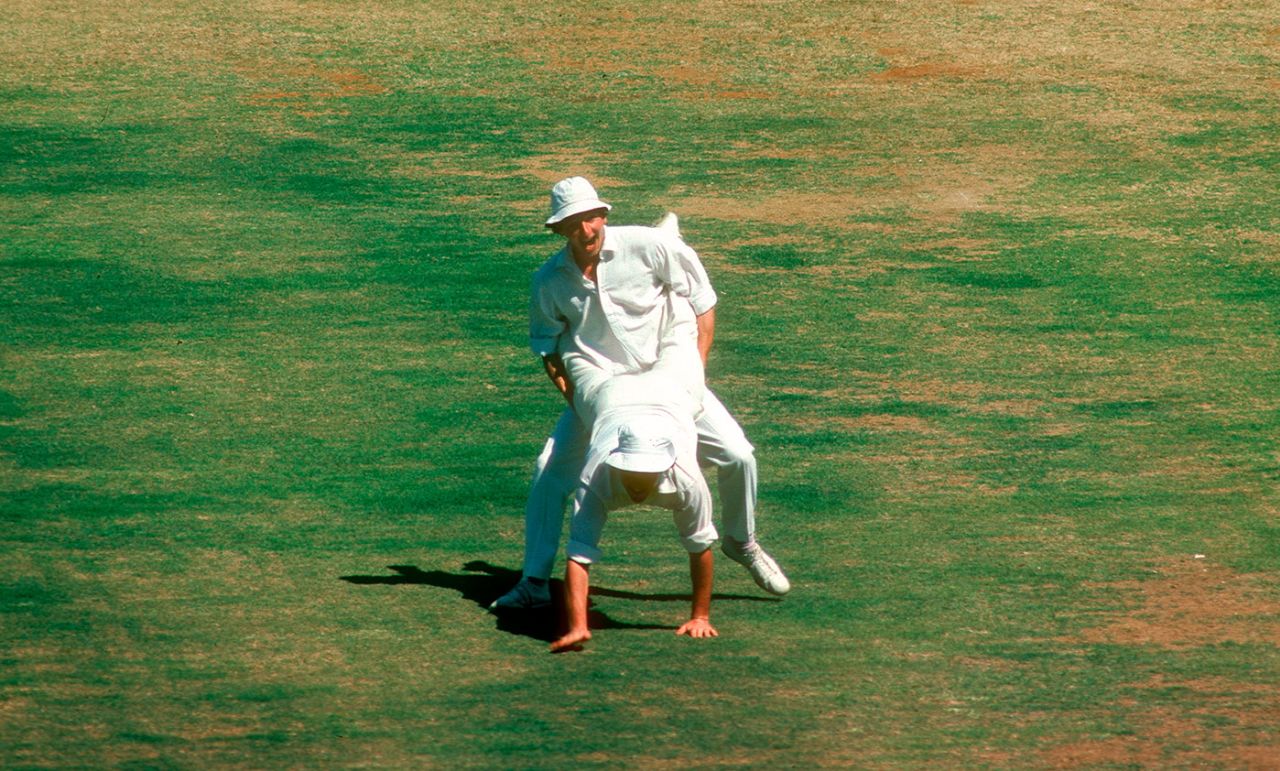 Derek Randall (standing) entertains the crowd with another team-mate, India v England, 3rd Test, Madras, January 1977