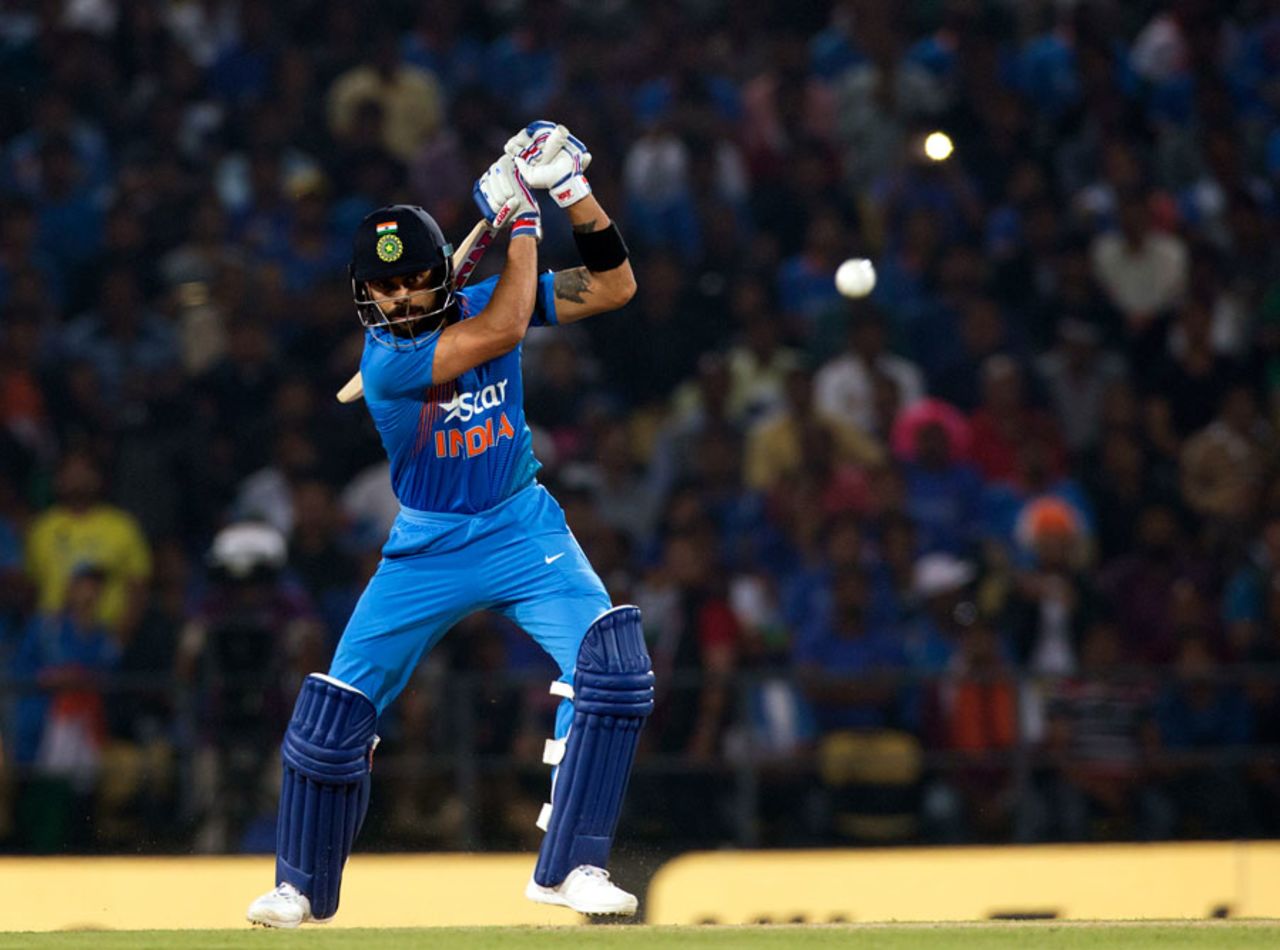 Virat Kohli cracks one through the off side, India v England, 2nd T20, Nagpur, January 29, 2017