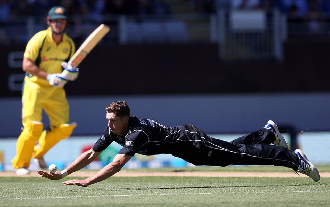 Mitchell Santner dives to make a save off his bowling, New Zealand v Australia, 1st ODI, Auckland, January 30, 2017