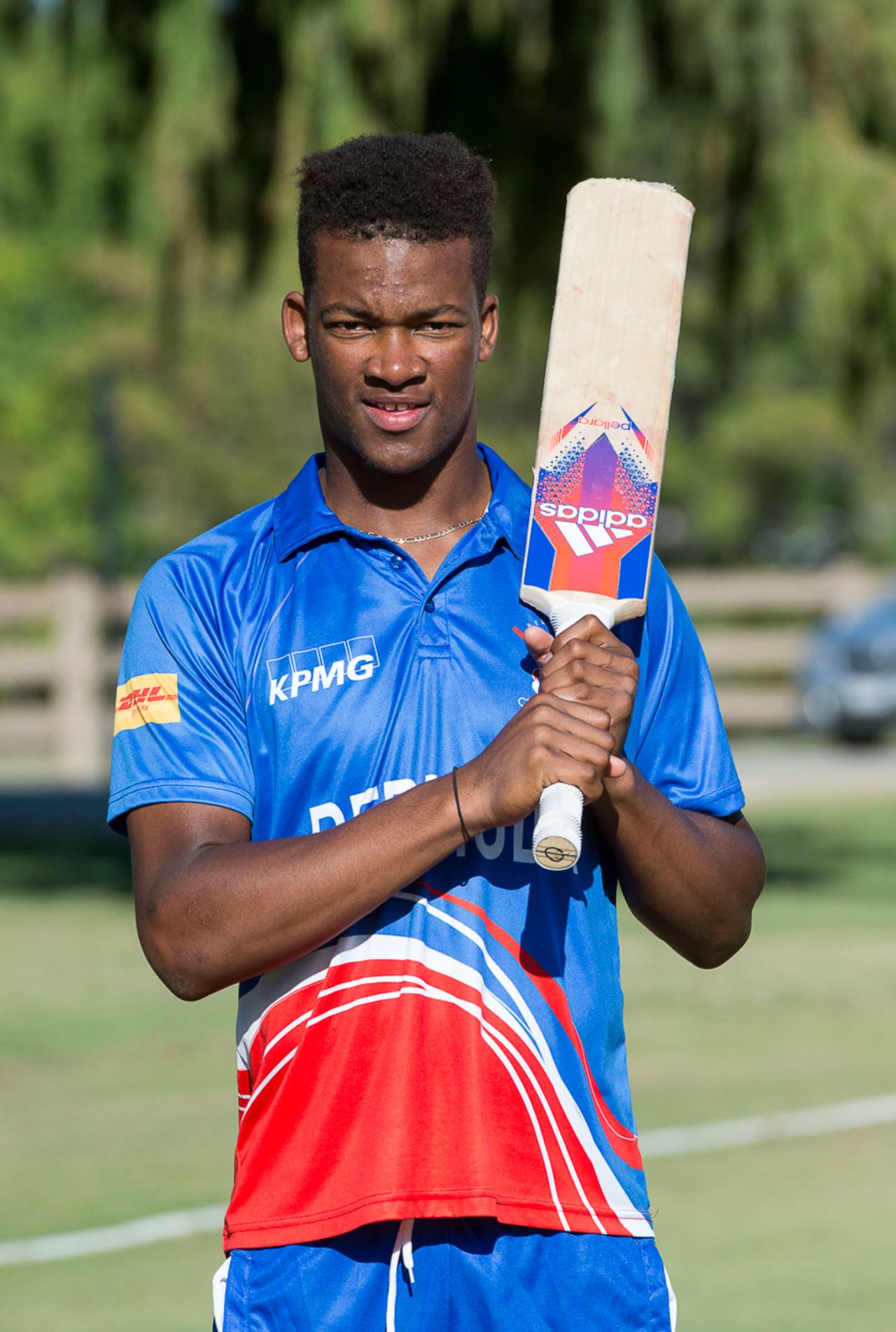 Delray Rawlins poses with his bat at Woodley Park, ICC World Cricket League Division Four, Los Angeles, November 1, 2016