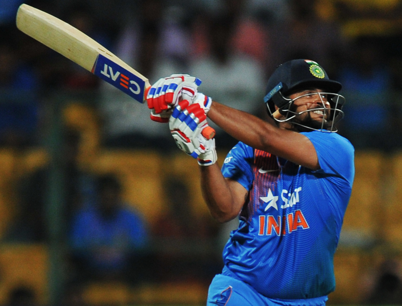 Suresh Raina muscles the ball away, India v England, 3rd T20I, Bangalore, February 1, 2017