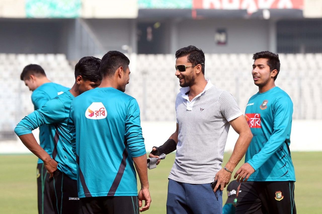 Mashrafe Mortaza shares a moment with his team-mates during practice, Dhaka, February 1, 2017