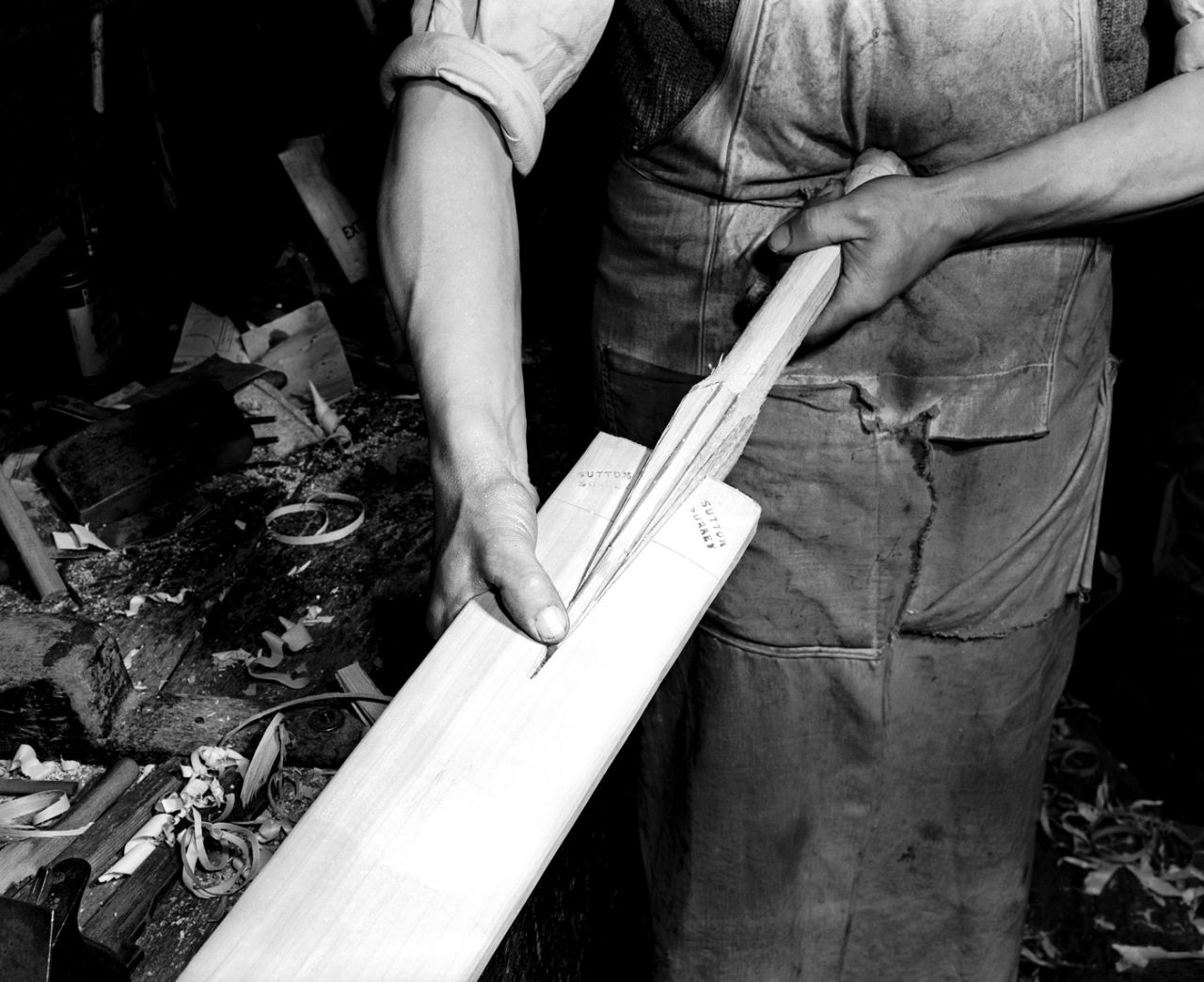 A bat handle being made from Sarawak cane