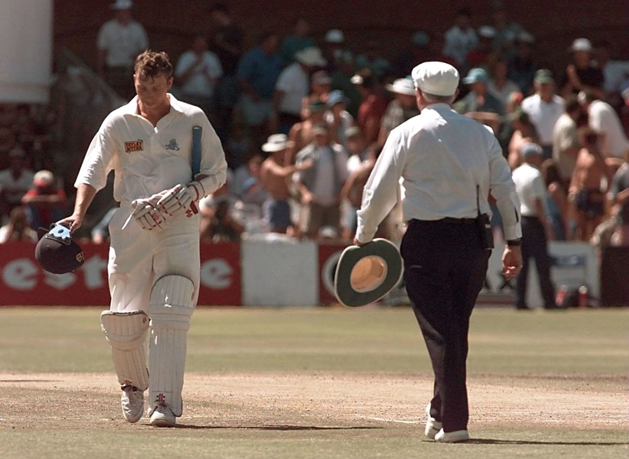 Mike Atherton walks past umpire Cyril Mitchley, who wrongly gave him caught off the thigh pad, South Africa v England, 4th Test, Port Elizabeth, 3rd day, December 28, 1995