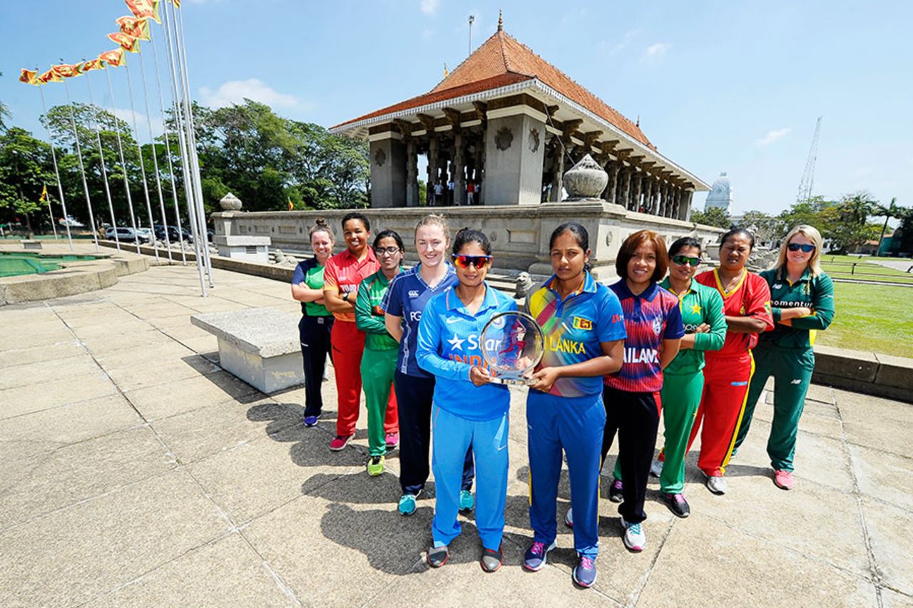 The captains of the ten participating teams pose with the Women's World Cup Qualifier trophy, Colombo, February 6, 2017