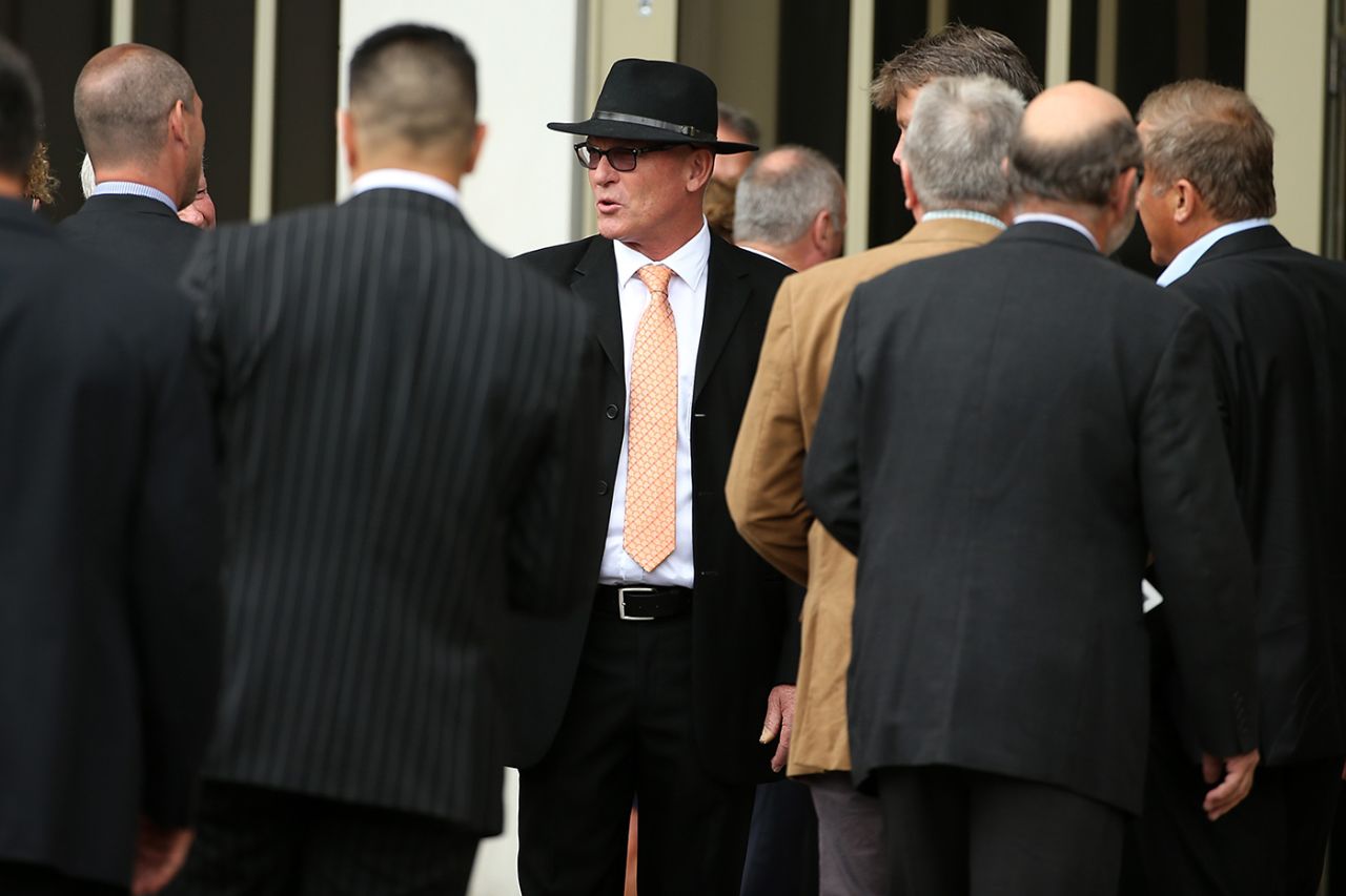 Jeff Crowe greets mourners at the funeral for his brother Martin Crowe, Auckland, March 11, 2016