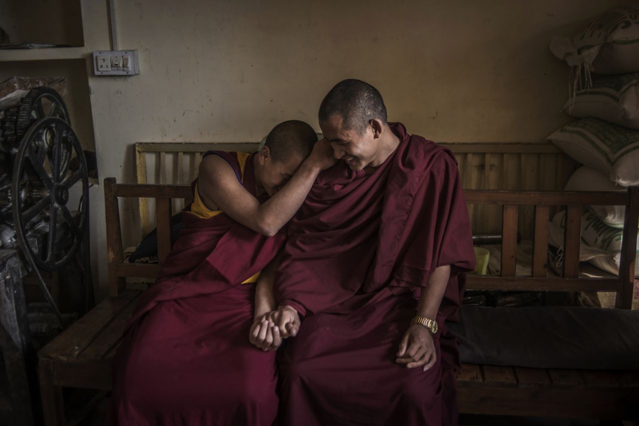 Young monks share a moment of joy in the temple in McLeod Ganj, Dharamshala.