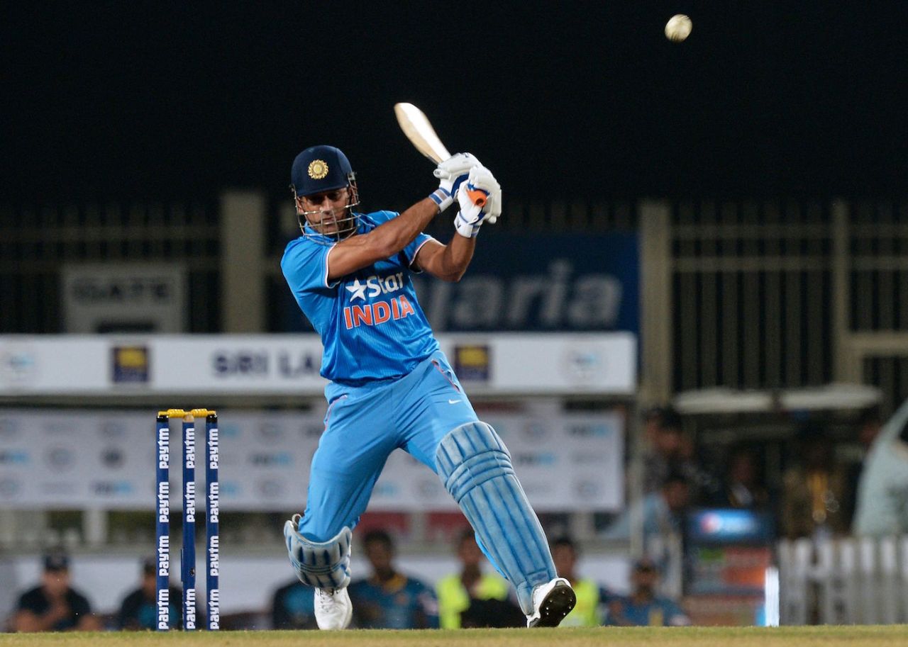 Mahendra Singh Dhoni plays a shot during the second Twenty20 (T20) international match between India and Sri Lanka at the Jharkhand State Cricket Association International Stadium Complex in Ranchi on February 12, 2016
