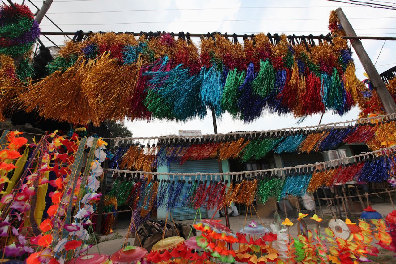 Roadside stalls sell colourful decorations for cars and trucks