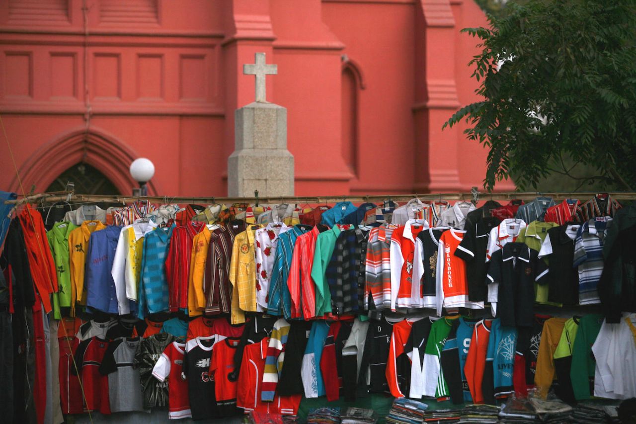 Colourful shirts lined up for sale outside the Gossner Evangelical Lutheran Church in Ranchi