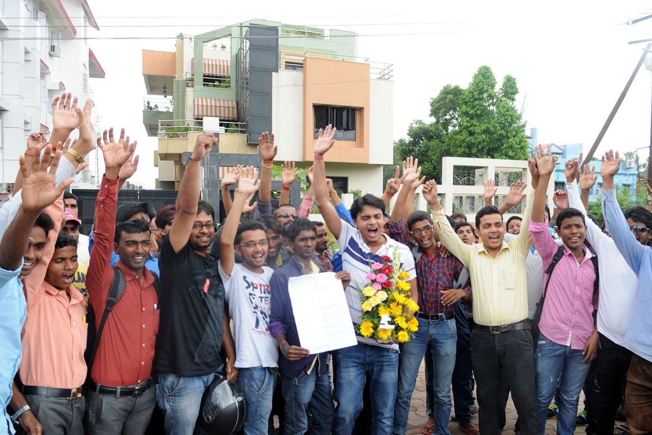 Fans stand outside MS Dhoni's house in Ranchi to wish him on his 34th birthday, July 7, 2015