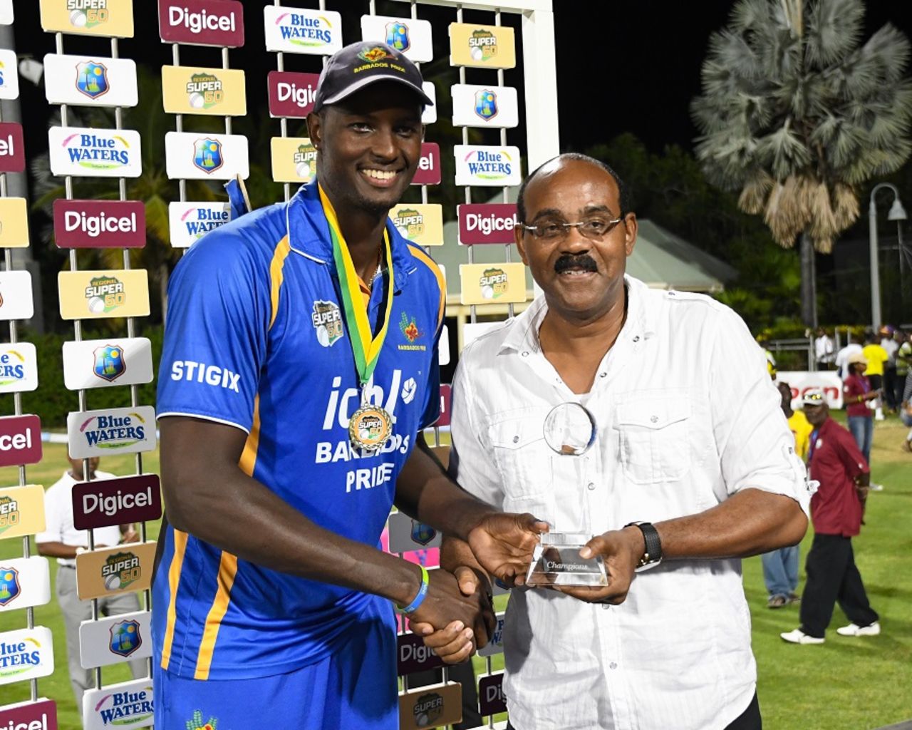 Jason Holder receives the trophy from Antigua and Barbuda Prime Minister Gaston Browne, Barbados v Jamaica, WICB Regional Super50 2016-17, Final, Antigua, February 15, 2017