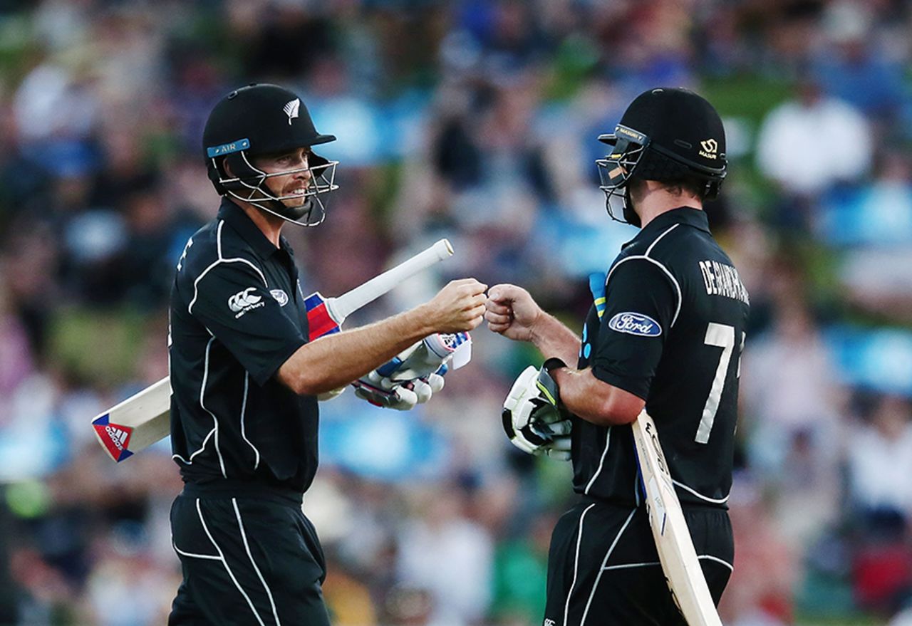 Tim Southee and Colin de Grandhomme share a fist bump during their rapid stand, New Zealand v South Africa, 1st ODI, Hamilton, February 19, 2017
