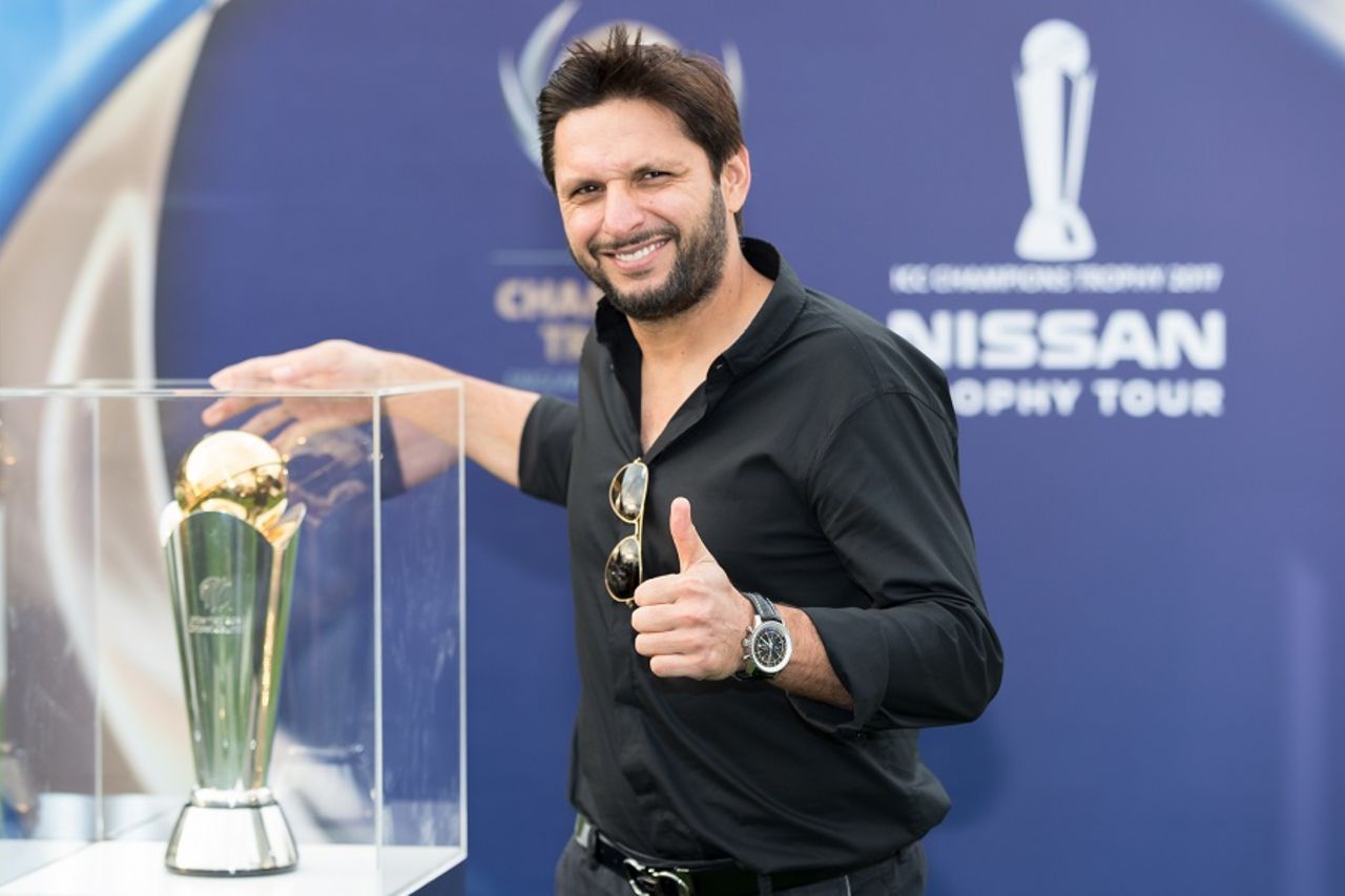 Say cheese: Shahid Afridi poses with the Champions Trophy, Dubai, February 21, 2017