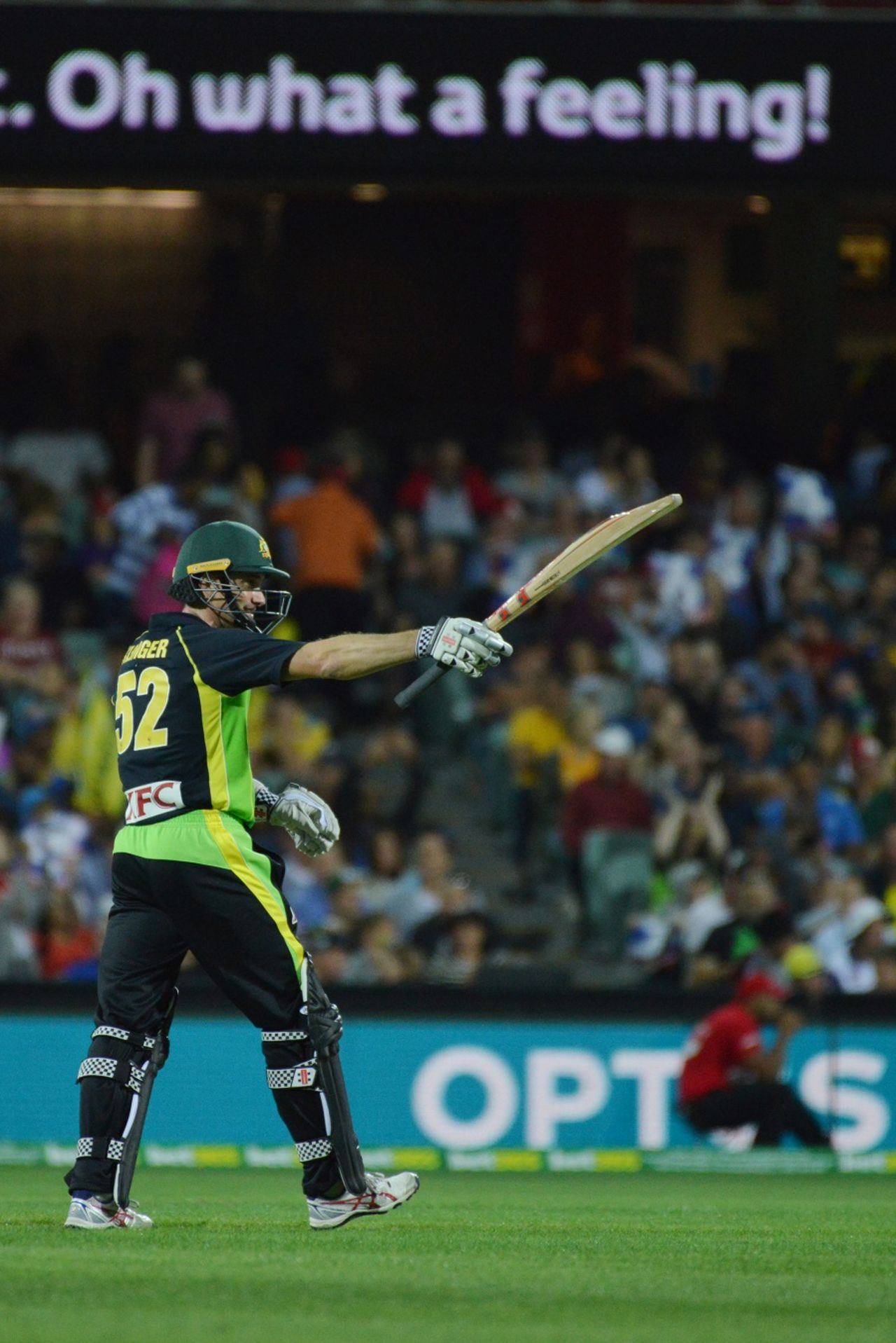 Michael Klinger raises his bat after reaching his fifty, Australia v Sri Lanka, 3rd T20 International, Adelaide, February 22, 2017