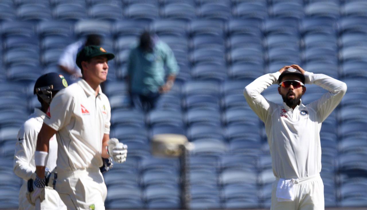 Virat Kohli reacts after a possible chance against Matt Renshaw, 1st Test, Pune, 1st day, February 23, 2017