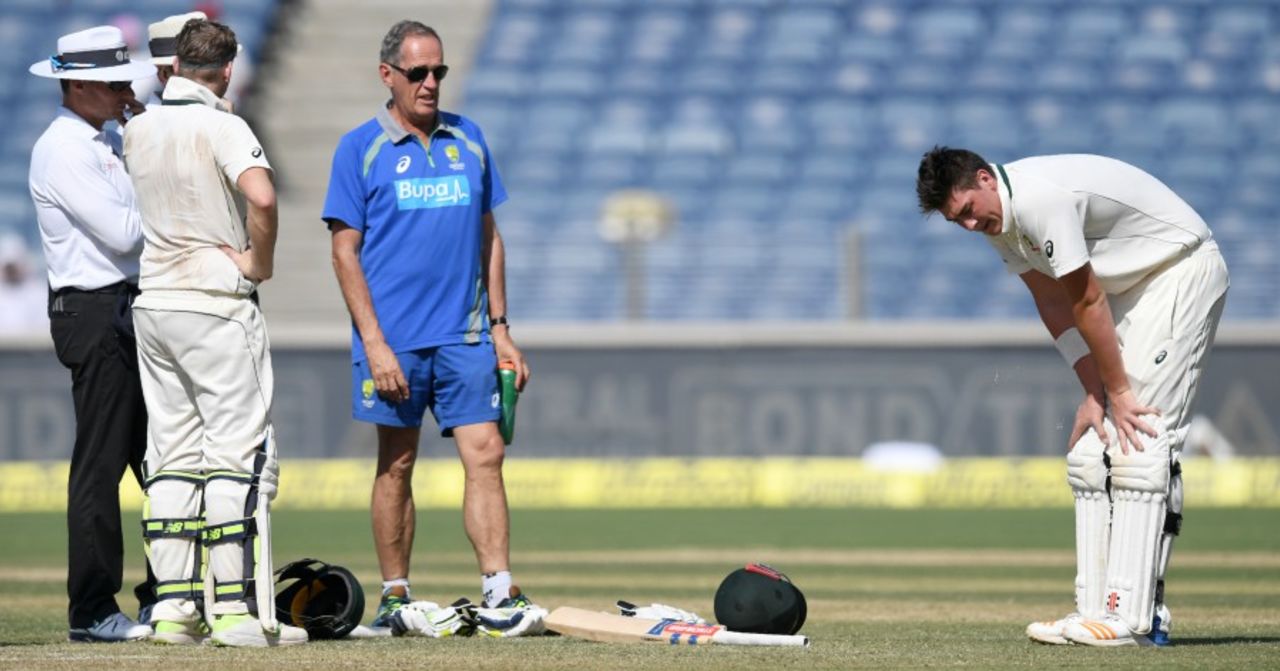 Matt Renshaw steadies himself after being hit on the forearm, India v Australia, 1st Test, Pune, 2nd day, February 24, 2017