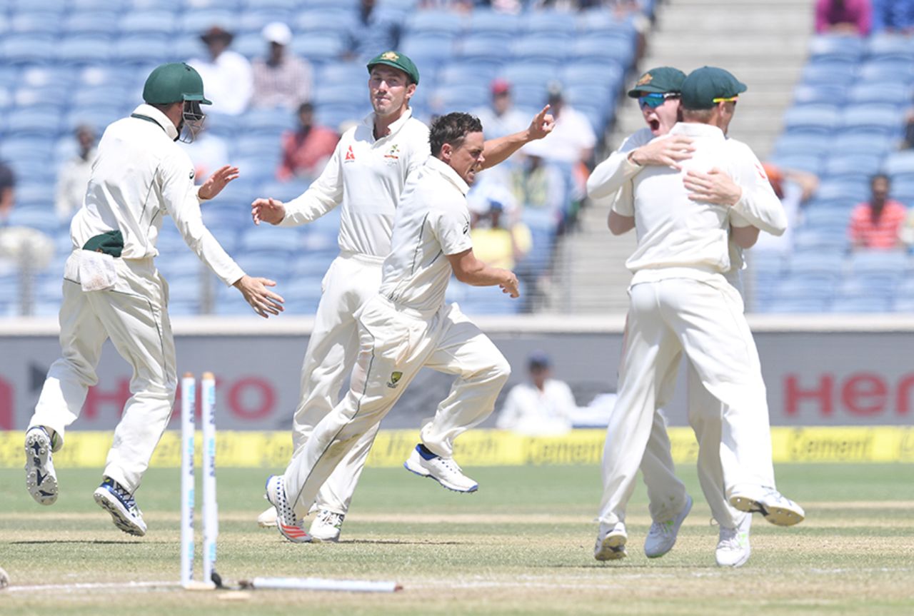 Steve O'Keefe and his team-mates are thrilled after Virat Kohli's wicket, India v Australia, 1st Test, Pune, 3rd day, February 25, 2017