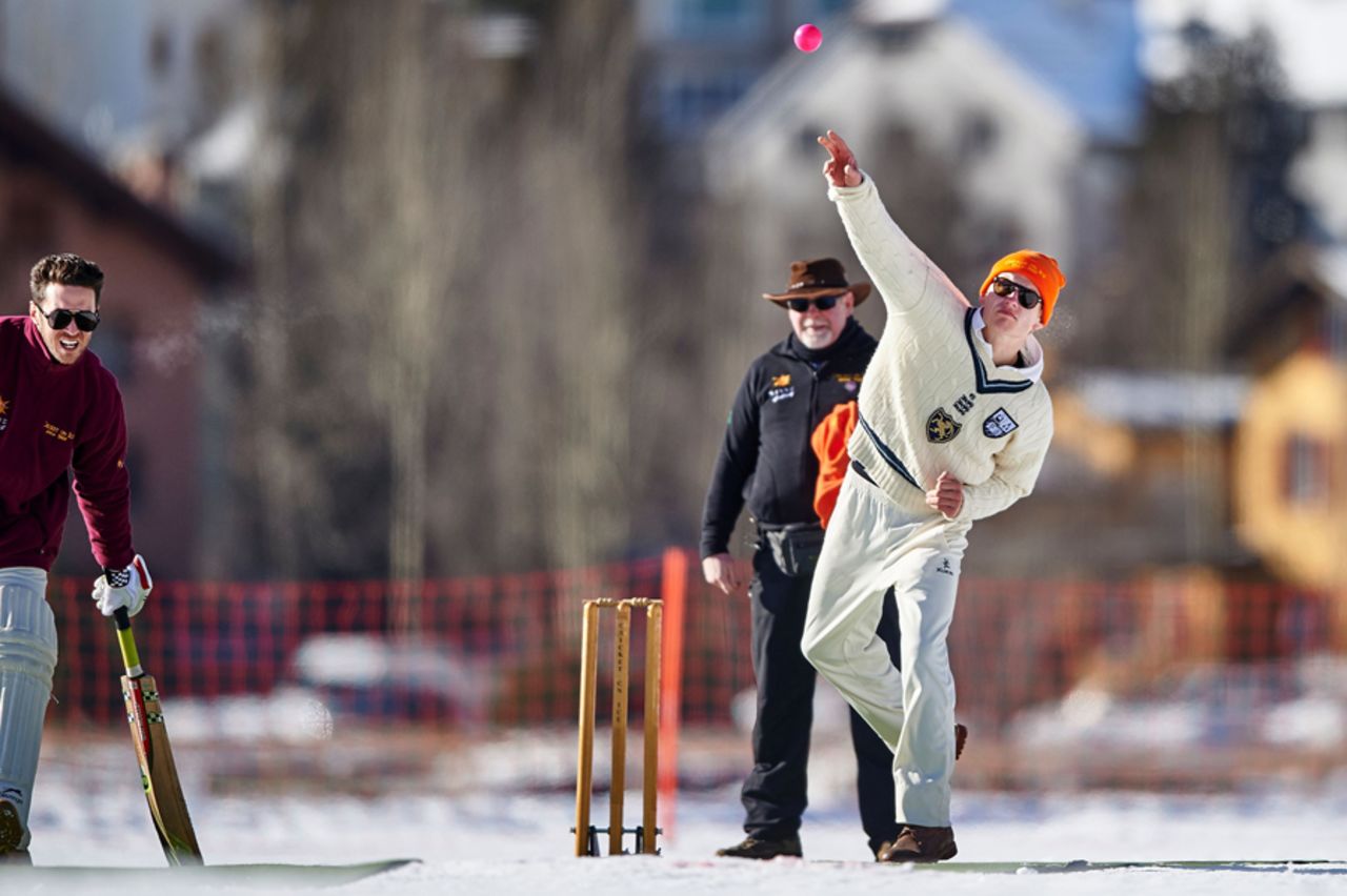 A bowler in his delivery stride during the 30th Cricket on Ice tournament, Switzerland, February 25, 2017