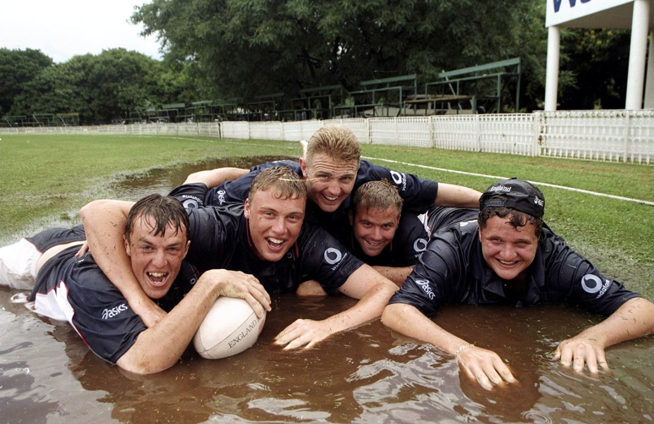 Graeme Swann, Andrew Flintoff, Darren Maddy, Matt Windows and Robert Key dive into a puddle in Harare, February 1, 1999