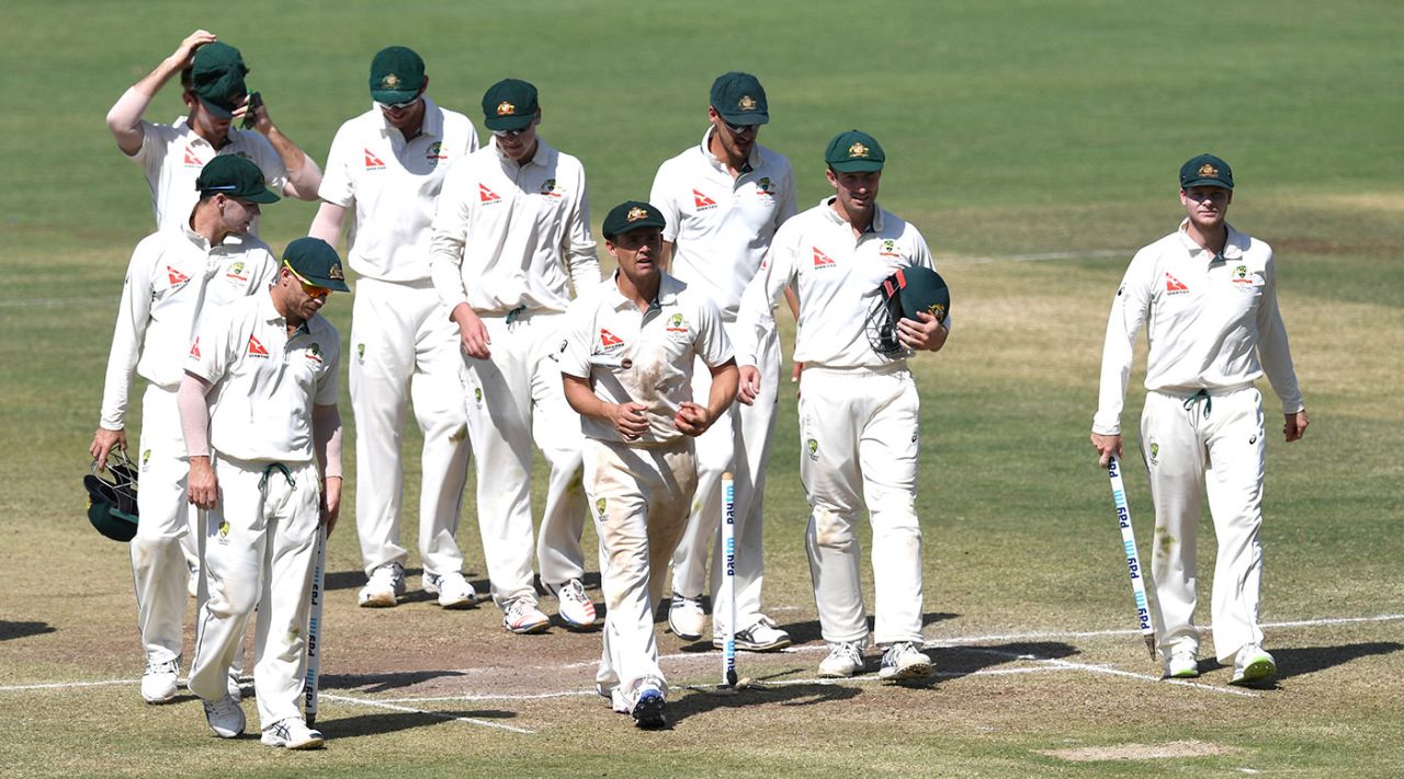 Australia walk back after the victory, India v Australia, 1st Test, Pune, 3rd day, February 25, 2017