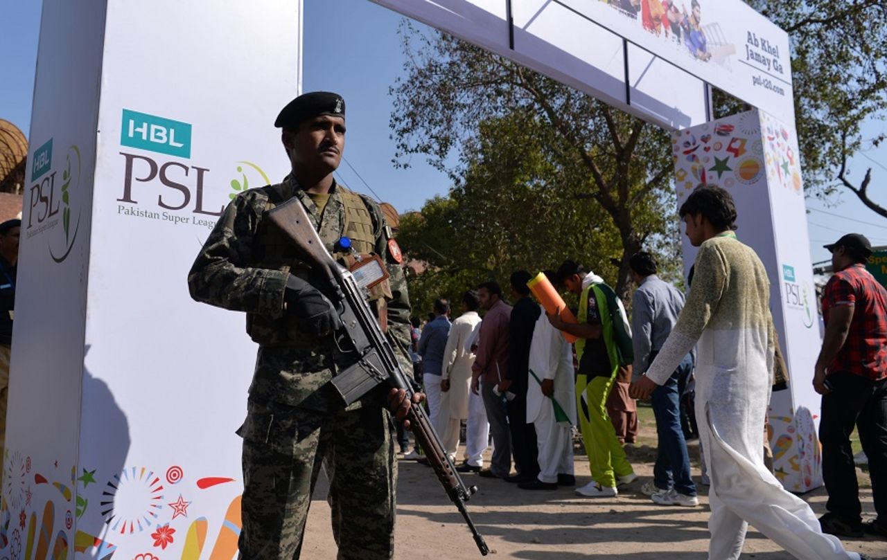 A Pakistani soldier stands guard at one of the entry gates, Peshawar Zalmi v Quetta Gladiators, PSL 2016-17, final, Lahore, March 5, 2017