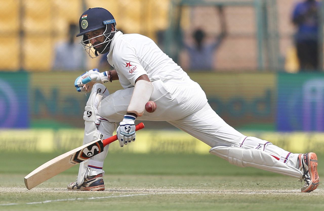 Cheteshwar Pujara plays the ball on the leg side, India v Australia, 2nd Test, Bengaluru, 3rd day, March 6, 2017
