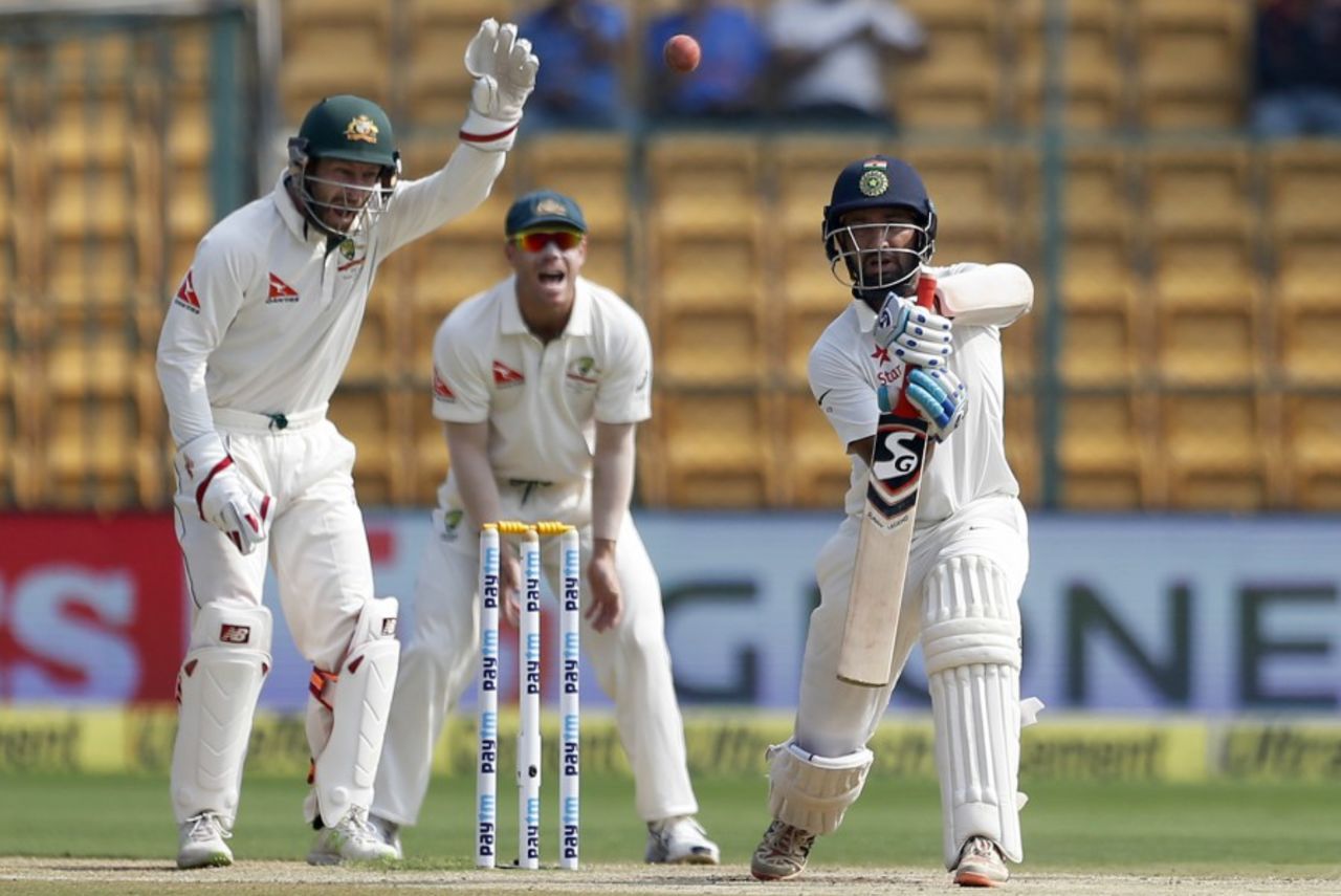 The Australian players appeal for Cheteshwar Pujara's wicket, India v Australia, 2nd Test, Bengaluru, 4th day, March 7, 2017