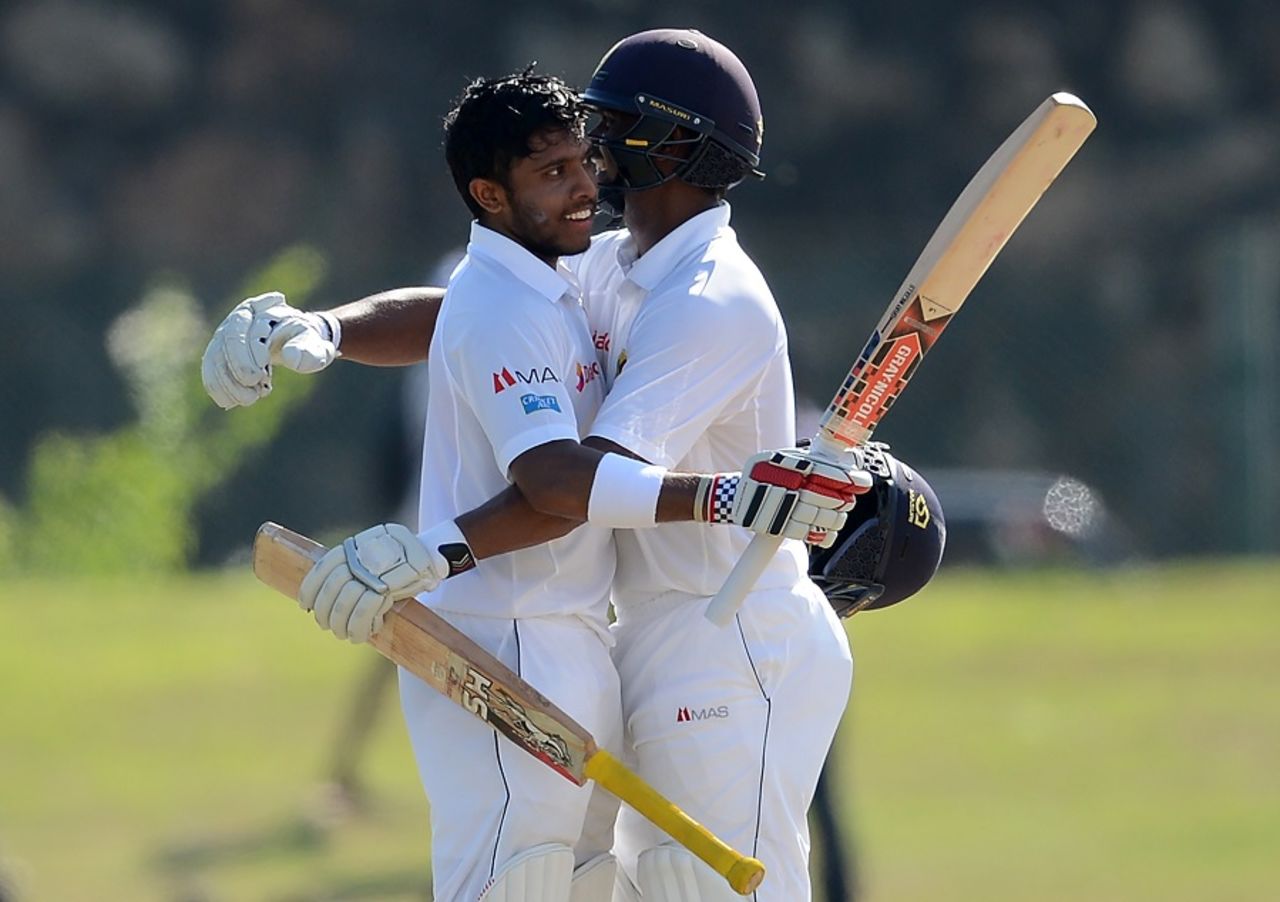 Kusal Mendis is congratulated by Asela Gunaratne after raising his century, Sri Lanka v Bangladesh, 1st Test, Galle, 1st day, March 7, 2017