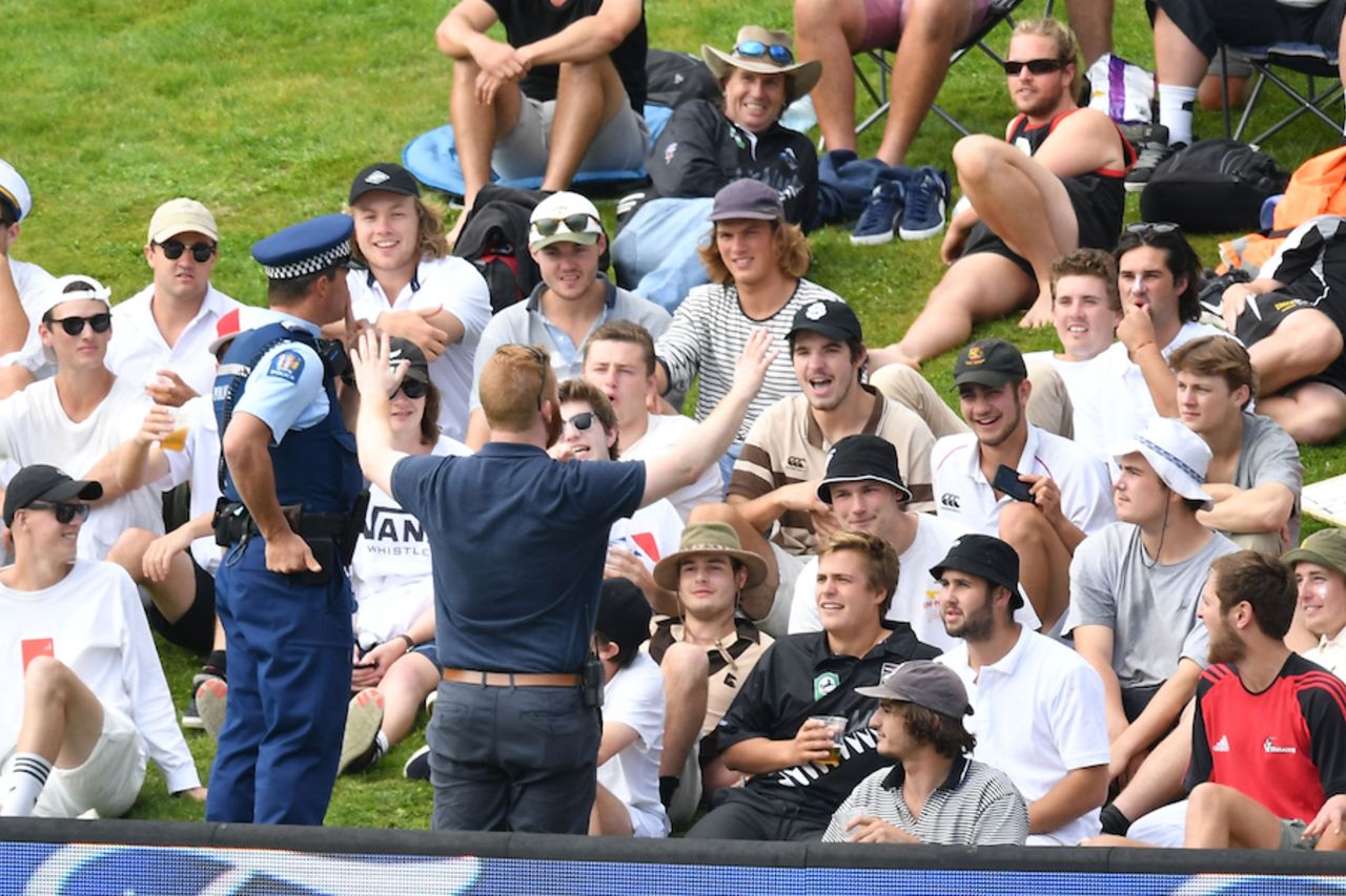 The police tries to control some New Zealand fans, New Zealand v South Africa, 1st Test, Dunedin, 2nd day, March 9, 2017