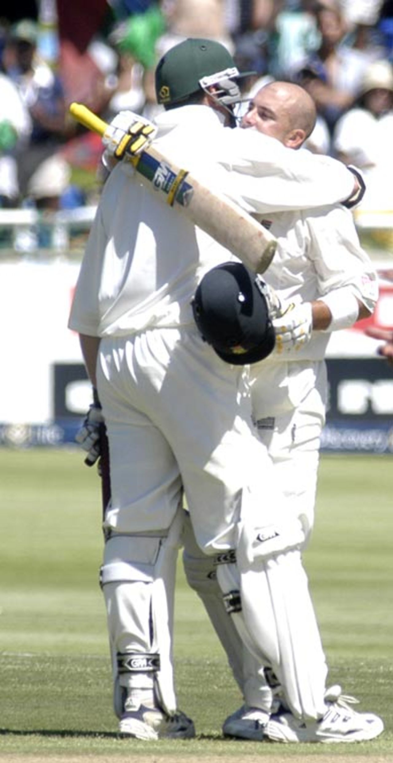 Herschelle Gibbs embraces Graeme Smith after scoring his century Pakistan at Newlands