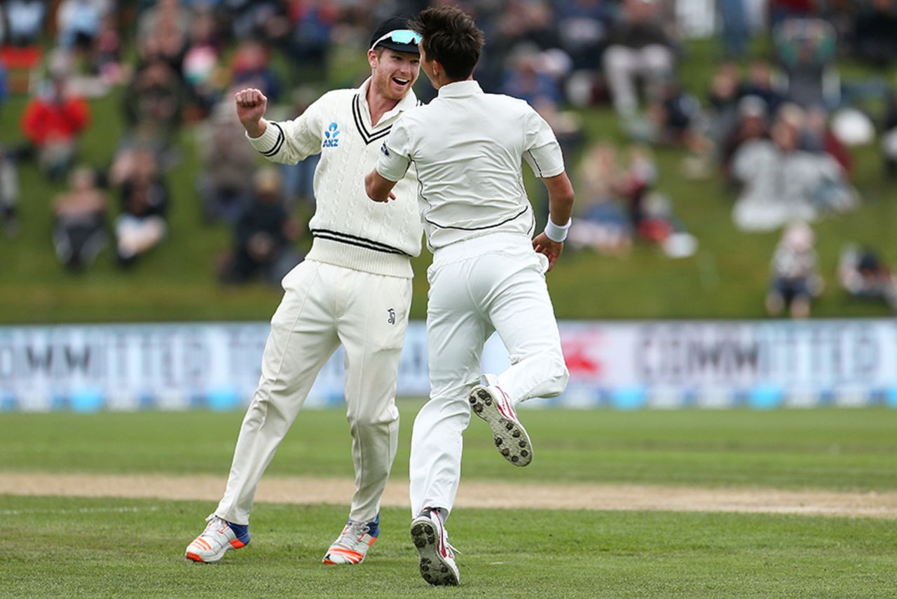 Jimmy Neesham and Trent Boult are jubilant after Stephen Cook's wicket, New Zealand v South Africa, 1st Test, Dunedin, 3rd day, March 10, 2017