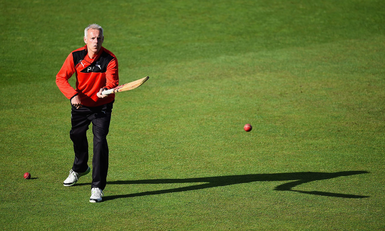 Peter Moores helps the players warm up, Trent Bridge, May 2, 2016